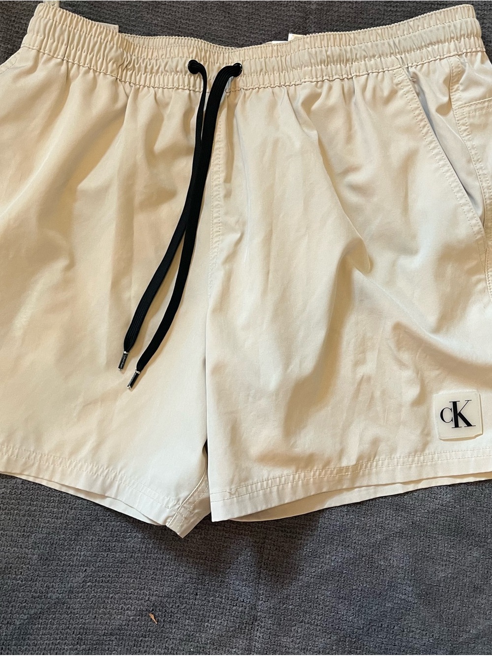 Calvin Klein Cream Shorts with Black Drawstring